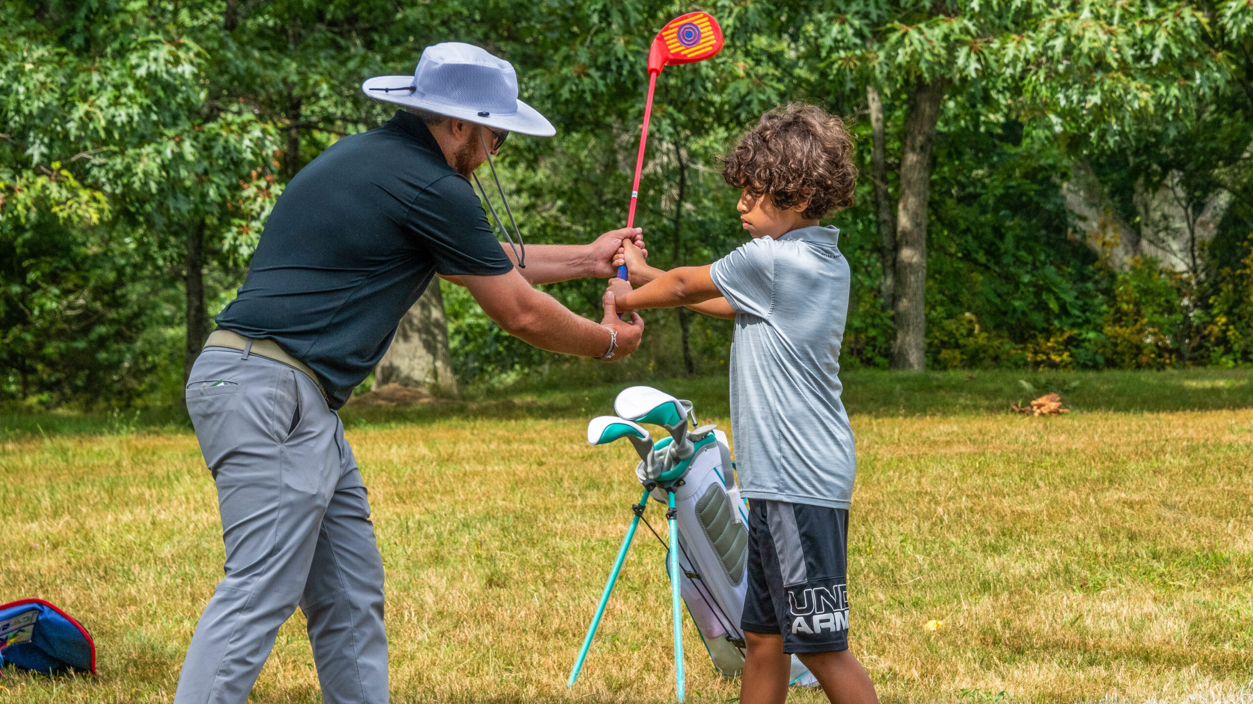 golf volunteer sharing his passion for the game of golf. 